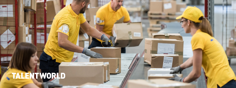 Seasonal workers packaging during the holidays.